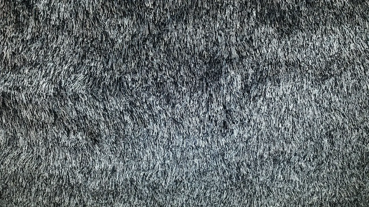 A close up of a black carpet