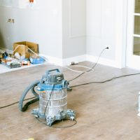 A wet-dry vacuum on a floor